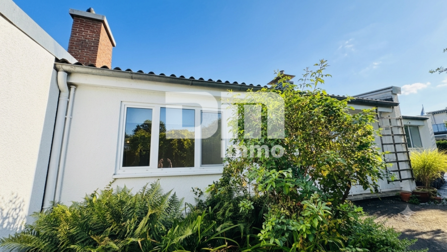 Charmantes altengerechtes Reihenmittelhaus mit idyllischem Garten in begehrter Lage - Frontansicht